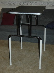 Grooming table with PVC pipe extensions